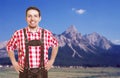 Laughing bavarian man with leather pants is ready for the oktoberfest Royalty Free Stock Photo