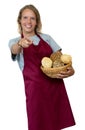 Laughing blond woman with bread rolls from the bakery