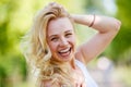 Laughing blonde girl with curly hair Royalty Free Stock Photo