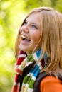 Laughing blonde young girl nature carefree autumn