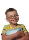 Laughing boy with book Royalty Free Stock Photo