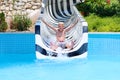 Laughing boy enjoying day in aquapark Royalty Free Stock Photo