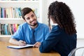 Laughing brazilian businessman at job interview Royalty Free Stock Photo