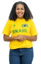 Laughing brazilian female soccer fan Royalty Free Stock Photo