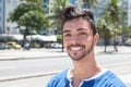 Laughing brazilian guy in a modern city Royalty Free Stock Photo