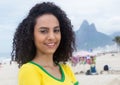 Laughing brazilian sports fan with curly hair at Rio de Janeiro Royalty Free Stock Photo