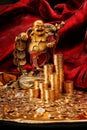 Laughing Budda with golden coins Royalty Free Stock Photo