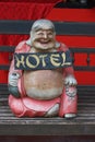 Laughing Buddha hotel sign