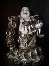 This is a laughing Buddha image at black background Royalty Free Stock Photo