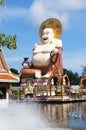 Laughing Buddha at Wat Plai Leam Temple in Koh Samui, Thailand