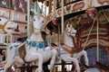 Laughing carousel horses.