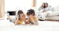 Laughing children listening music with headphones Royalty Free Stock Photo