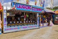 Laughing clowns booth at a country funfair.