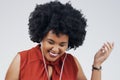 Laughing, dance or happy black woman in music headphones in studio for singing on grey background. Model, funny podcast Royalty Free Stock Photo