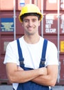 Laughing docker infront of an oversea container Royalty Free Stock Photo