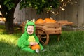 Laughing dragon baby in Halloween costume Royalty Free Stock Photo