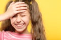 Laughing embarrassed girl cover forehead facepalm Royalty Free Stock Photo