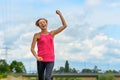 Laughing extrovert woman rejoicing outdoors