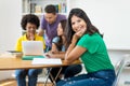 Laughing female student with group of multi ehtnic students Royalty Free Stock Photo