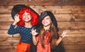 Funny children sister twins girl in witch costume in halloween Royalty Free Stock Photo