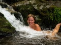 Laughing girl bathing