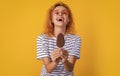 laughing girl with icelolly ice cream in studio. girl with icelolly ice cream on background. Royalty Free Stock Photo