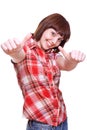 Laughing girl in a shirt giving thumbs-up