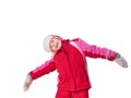 The laughing girl wearing red overalls and mittens Royalty Free Stock Photo