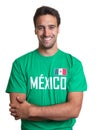 Laughing guy in a mexican jersey with crossed arms Royalty Free Stock Photo