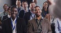Laughing, happy and business people or audience at conference, seminar or training workshop. Diversity men and women Royalty Free Stock Photo