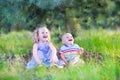 Laughing kids playing in a forest Royalty Free Stock Photo