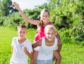 Laughing kids running on grass Royalty Free Stock Photo