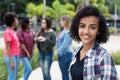 Laughing latin american woman with group of girlfriends Royalty Free Stock Photo