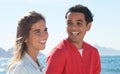 Laughing latin couple at beach Royalty Free Stock Photo