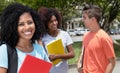 Laughing latin female student with two friends Royalty Free Stock Photo