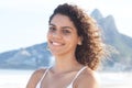 Laughing latin woman with curly hair at beach at Rio de Janeiro Royalty Free Stock Photo