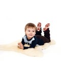 Laughing little boy laying on floor Royalty Free Stock Photo