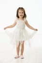 Laughing little girl in ballet costume Royalty Free Stock Photo