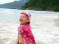 Laughing Little Girl on the Beach