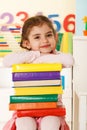 Little girl with books Royalty Free Stock Photo