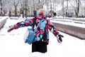 A laughing little girl playing with snow Royalty Free Stock Photo