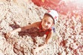 Laughing Little Girl in Protective Helmet climbing Rock Royalty Free Stock Photo