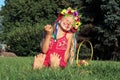 Laughing little girl in wreath