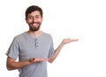 Laughing man with beard presents something Royalty Free Stock Photo