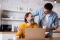 laughing man looking at young hispanic Royalty Free Stock Photo