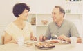 Laughing man and woman talking and having lunch Royalty Free Stock Photo