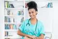 Laughing mexican female nurse or medical student Royalty Free Stock Photo