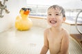 Laughing Mixed Race Boy Having Fun at the Water Park Royalty Free Stock Photo