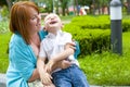 Laughing mother and her four-year-old son