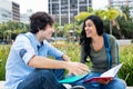 Laughing native latin american student learning with friend Royalty Free Stock Photo